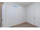 Bright room with fresh paint, wood floors, closet with wire shelving, and a bright white door at 7151 Firestone Rd, Whitestown, IN 46052