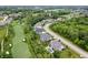 Beautiful aerial shot of the home near a golf course with mature trees and manicured landscaping at 780 Chatham Hills Blvd, Westfield, IN 46074