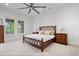 A light and airy bedroom with a decorative bed frame, neutral walls, and a large window for ample natural light at 780 Chatham Hills Blvd, Westfield, IN 46074