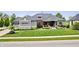 Charming home with lush lawn, professional landscaping and a three-car garage at 780 Chatham Hills Blvd, Westfield, IN 46074