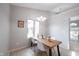 Inviting dining room featuring a large window with lots of natural light at 8023 Talliho Dr, Indianapolis, IN 46256
