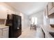 Cozy kitchen featuring a dining area and functional appliances at 8023 Talliho Dr, Indianapolis, IN 46256