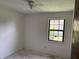 Bright bedroom featuring a window and clean white walls at 812 N California St, Indianapolis, IN 46202