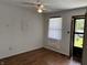 Room featuring new flooring, large window and fresh paint, awaiting personal touches at 812 N California St, Indianapolis, IN 46202
