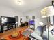 Comfortable living room showing seamless connection to the kitchen and dining areas at 813 Cottage Ave, Columbus, IN 47201