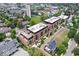 Aerial view of a residential complex with lush green surroundings and well-maintained landscaping at 855 N East N St # 104-B, Indianapolis, IN 46202