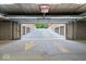 Garage entrance showcasing the open space and drive at 855 N East N St # 104-B, Indianapolis, IN 46202