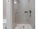 Modern tiled shower with glass enclosure and upscale fixtures at 855 N East N St # 104-B, Indianapolis, IN 46202
