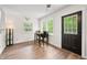 Charming dining area with a view to the outside, wood floors, and an inviting atmosphere at 8576 Riser Dr, , IN 46164