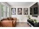 Stylish living room with comfortable leather sofa, modern entertainment setup, and natural light at 8576 Riser Dr, , IN 46164