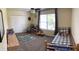 Bright bedroom with ceiling fan, large window, and plenty of space for play and relaxation at 8926 Durban Ct, Indianapolis, IN 46234