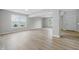 Spacious basement features wood-look flooring, natural light, and an open layout at 9949 Nightsong Ln, Avon, IN 46123