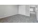 Cozy bedroom with plush carpet, closet space, and ample natural light from a window at 9949 Nightsong Ln, Avon, IN 46123