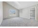 Bright bedroom with vaulted ceilings, neutral walls, carpet and a large window at 9949 Nightsong Ln, Avon, IN 46123