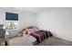 This cozy bedroom with a pull-out bed, offers a lovely window with a playground view at 10118 Falls Canyon Ln, Indianapolis, IN 46229