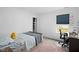 This bedroom features neutral walls, a window, and a convenient closet for storage at 10118 Falls Canyon Ln, Indianapolis, IN 46229