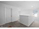 Upstairs hallway provides access to the home's upper rooms and bedrooms at 10118 Falls Canyon Ln, Indianapolis, IN 46229
