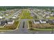 Planned community features well-maintained homes and landscaped green spaces for residents at 10118 Falls Canyon Ln, Indianapolis, IN 46229