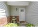 Inviting entryway with a decorative fountain and a charming front door at 10262 Carmine Dr, Noblesville, IN 46060