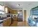 Well-lit kitchen featuring stainless steel appliances and ample cabinet space at 10262 Carmine Dr, Noblesville, IN 46060