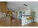 Eat-in kitchen with stainless steel appliances and breakfast bar seating at 10262 Carmine Dr, Noblesville, IN 46060
