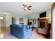 Inviting living room with high ceilings and a charming fireplace at 10262 Carmine Dr, Noblesville, IN 46060