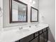 Bathroom featuring a double sink vanity with modern fixtures and mirrors, providing style and functionality at 10806 Solis Cir, Fishers, IN 46038