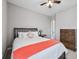 Bedroom with ceiling fan and dresser at 10806 Solis Cir, Fishers, IN 46038