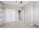 Well-lit bedroom with plush carpet and ample closet space creates a functional and inviting retreat at 10806 Solis Cir, Fishers, IN 46038