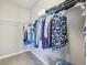 Walk in closet with ample hanging space at 10806 Solis Cir, Fishers, IN 46038