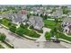Aerial view of a beautiful two-story home with a manicured lawn and landscaping in a suburban neighborhood at 10806 Solis Cir, Fishers, IN 46038