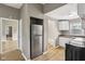 Modern kitchen with stainless steel appliances and white cabinets, perfect for culinary enthusiasts at 1106 N Sheffield Ave, Indianapolis, IN 46222