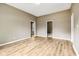 Spacious living room with hardwood floors and plenty of natural light, perfect for entertaining at 1106 N Sheffield Ave, Indianapolis, IN 46222