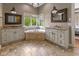 A large bathroom featuring a soaking tub, dual vanity, and tile flooring at 11761 Darsley Dr, Fishers, IN 46037