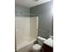 Bathroom featuring a tub shower, toilet, and sink vanity at 12307 Chiseled Stone Dr, Fishers, IN 46037