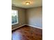 Bedroom featuring wood floors, natural light, and neutral colors at 12307 Chiseled Stone Dr, Fishers, IN 46037