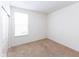 Bedroom featuring carpet and a window providing natural light, with a closet maximizing space at 12820 Gloria Dr, Fishers, IN 46037