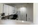 Practical kitchen with white cabinetry, neutral countertops, and modern appliances at 1294 Kenwood Dr, Greenwood, IN 46143