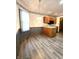 Cozy dining area with updated flooring, cabinetry, and recessed lighting at 1311 Aaron Dr, Shelbyville, IN 46176