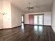 Open-concept living room boasts high ceilings and flows into the dining area at 1311 Aaron Dr, Shelbyville, IN 46176