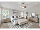Spacious bedroom features a ceiling fan, bedside tables, and stylish decor accents at 1343 Turfway Dr, Avon, IN 46123