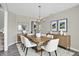 Elegant dining room showcasing a modern chandelier and stylish décor at 1343 Turfway Dr, Avon, IN 46123