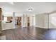 Open concept living room features hardwood floors and seamless flow to kitchen at 1343 Turfway Dr, Avon, IN 46123