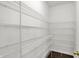 Spacious walk-in pantry with ample shelving for organized storage at 1343 Turfway Dr, Avon, IN 46123