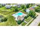 Aerial view of community pool with lounge chairs and picnic area, perfect for relaxing on a summer day at 1343 Turfway Dr, Avon, IN 46123