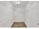 Walk-in closet with carpeted floor and metal racks at 1343 Turfway Dr, Avon, IN 46123