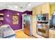 Well-equipped kitchen boasting stainless steel appliances, and modern cabinetry at 1411 N Kenmore Rd, Indianapolis, IN 46219