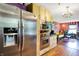 Bright kitchen showcasing stainless steel appliances, light wood cabinets and modern design at 1411 N Kenmore Rd, Indianapolis, IN 46219