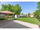 Well-maintained backyard with a patio, shed, grassy area, and a privacy fence at 1450 Millridge Dr, Greenwood, IN 46143