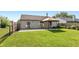 Backyard view with an inviting patio and gazebo, ideal for outdoor dining and entertaining at 1450 Millridge Dr, Greenwood, IN 46143